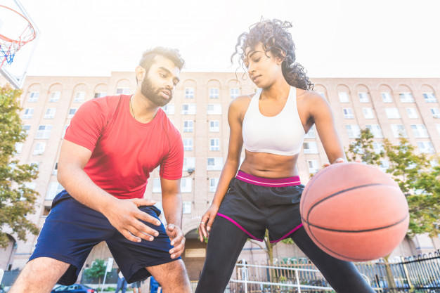 woman-vs-man-playing-basketball-toronto_108072-2016